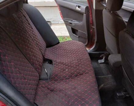 Червоний Міцубісі Lancer, об'ємом двигуна 2 л та пробігом 228 тис. км за 6200 $, фото 11 на Automoto.ua