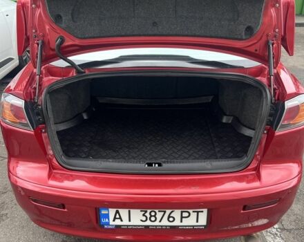 Червоний Міцубісі Lancer, об'ємом двигуна 2 л та пробігом 240 тис. км за 4900 $, фото 4 на Automoto.ua