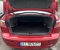 Червоний Міцубісі Lancer, об'ємом двигуна 2 л та пробігом 240 тис. км за 4900 $, фото 4 на Automoto.ua