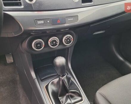 Красный Мицубиси Лансер, объемом двигателя 2 л и пробегом 120 тыс. км за 7800 $, фото 26 на Automoto.ua