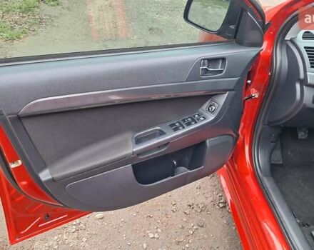 Красный Мицубиси Лансер, объемом двигателя 2 л и пробегом 120 тыс. км за 7800 $, фото 24 на Automoto.ua