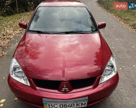 Міцубісі Lancer 2009 у Вінниці на Automoto.ua Червоний Міцубісі Lancer, об'ємом двигуна 1.58 л та пробігом 133 тис. км за 6750 $, фото 16 на Automoto.ua
