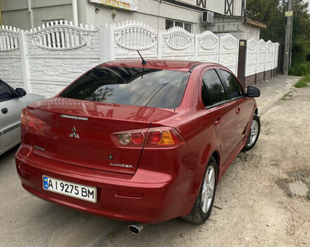 Красный Мицубиси Лансер, объемом двигателя 2 л и пробегом 225 тыс. км за 7200 $, фото 7 на Automoto.ua