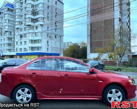 Червоний Міцубісі Lancer, об'ємом двигуна 2 л та пробігом 120 тис. км за 2999 $, фото 2 на Automoto.ua