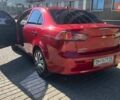 Красный Мицубиси Лансер, объемом двигателя 1.5 л и пробегом 250 тыс. км за 6000 $, фото 6 на Automoto.ua
