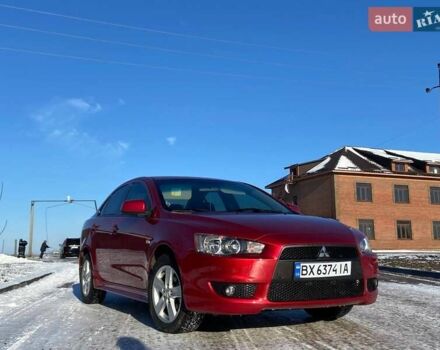 Червоний Міцубісі Lancer, об'ємом двигуна 2 л та пробігом 218 тис. км за 5955 $, фото 2 на Automoto.ua