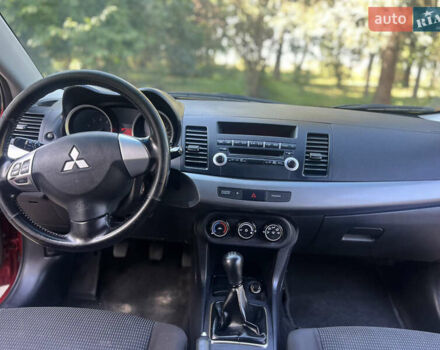 Червоний Міцубісі Lancer, об'ємом двигуна 1.5 л та пробігом 162 тис. км за 5800 $, фото 7 на Automoto.ua