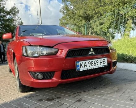 Красный Мицубиси Лансер, объемом двигателя 2 л и пробегом 215 тыс. км за 5999 $, фото 5 на Automoto.ua