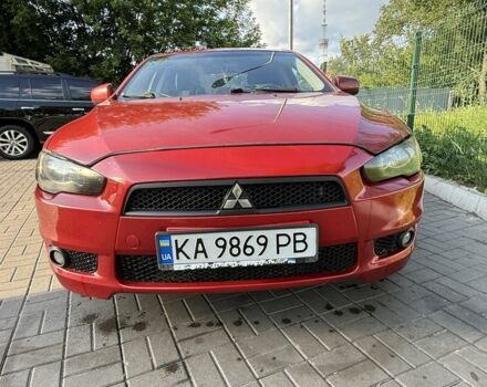 Красный Мицубиси Лансер, объемом двигателя 2 л и пробегом 215 тыс. км за 5999 $, фото 6 на Automoto.ua