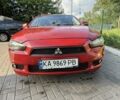 Красный Мицубиси Лансер, объемом двигателя 2 л и пробегом 213 тыс. км за 6400 $, фото 5 на Automoto.ua