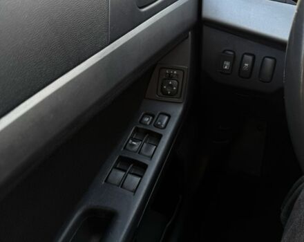 Красный Мицубиси Лансер, объемом двигателя 2 л и пробегом 215 тыс. км за 5999 $, фото 14 на Automoto.ua