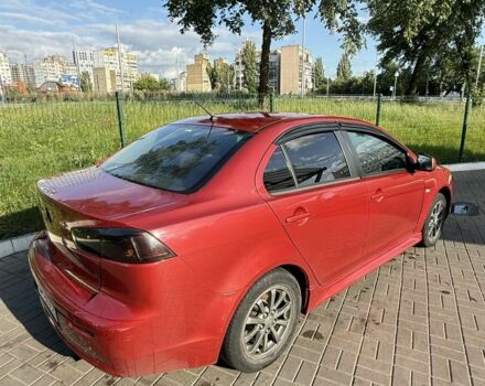 Красный Мицубиси Лансер, объемом двигателя 2 л и пробегом 215 тыс. км за 5999 $, фото 7 на Automoto.ua