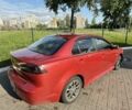 Красный Мицубиси Лансер, объемом двигателя 2 л и пробегом 213 тыс. км за 6400 $, фото 7 на Automoto.ua
