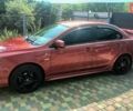 Червоний Міцубісі Lancer, об'ємом двигуна 2 л та пробігом 173 тис. км за 6900 $, фото 1 на Automoto.ua