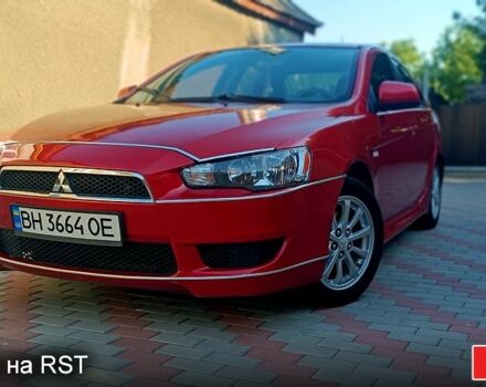 Красный Мицубиси Лансер, объемом двигателя 2 л и пробегом 254 тыс. км за 6300 $, фото 2 на Automoto.ua