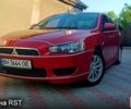 Красный Мицубиси Лансер, объемом двигателя 2 л и пробегом 254 тыс. км за 6300 $, фото 2 на Automoto.ua