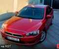 Червоний Міцубісі Lancer, об'ємом двигуна 2 л та пробігом 254 тис. км за 6300 $, фото 1 на Automoto.ua