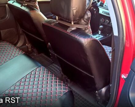 Красный Мицубиси Лансер, объемом двигателя 2 л и пробегом 254 тыс. км за 6300 $, фото 12 на Automoto.ua