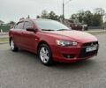 Червоний Міцубісі Lancer, об'ємом двигуна 1.5 л та пробігом 160 тис. км за 7013 $, фото 1 на Automoto.ua
