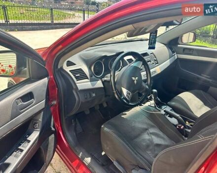 Червоний Міцубісі Lancer, об'ємом двигуна 1.5 л та пробігом 210 тис. км за 7800 $, фото 10 на Automoto.ua