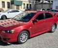 Червоний Міцубісі Lancer, об'ємом двигуна 2 л та пробігом 242 тис. км за 6500 $, фото 1 на Automoto.ua