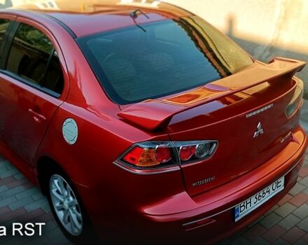 Красный Мицубиси Лансер, объемом двигателя 2 л и пробегом 254 тыс. км за 6300 $, фото 5 на Automoto.ua