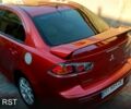 Красный Мицубиси Лансер, объемом двигателя 2 л и пробегом 254 тыс. км за 6300 $, фото 5 на Automoto.ua