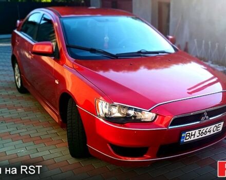 Красный Мицубиси Лансер, объемом двигателя 2 л и пробегом 254 тыс. км за 6300 $, фото 3 на Automoto.ua