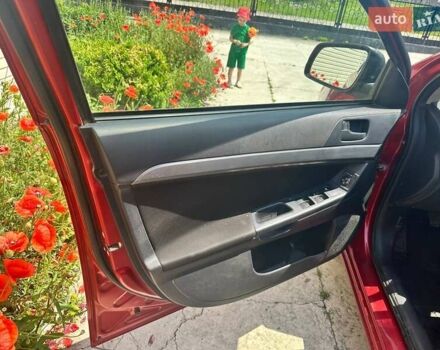 Червоний Міцубісі Lancer, об'ємом двигуна 1.5 л та пробігом 210 тис. км за 7800 $, фото 11 на Automoto.ua