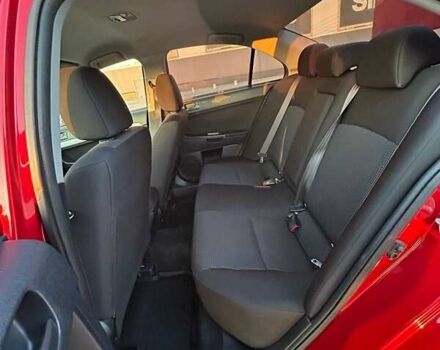 Красный Мицубиси Лансер, объемом двигателя 1.5 л и пробегом 81 тыс. км за 8800 $, фото 8 на Automoto.ua