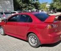 Мицубиси Лансер 2011 в Днепре (Днепропетровске) на Automoto.ua Красный Мицубиси Лансер, объемом двигателя 2 л и пробегом 242 тыс. км за 6500 $, фото 2 на Automoto.ua