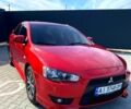 Червоний Міцубісі Lancer, об'ємом двигуна 2 л та пробігом 252 тис. км за 7300 $, фото 1 на Automoto.ua
