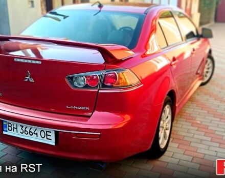 Красный Мицубиси Лансер, объемом двигателя 2 л и пробегом 254 тыс. км за 6300 $, фото 4 на Automoto.ua