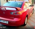 Красный Мицубиси Лансер, объемом двигателя 2 л и пробегом 254 тыс. км за 6300 $, фото 4 на Automoto.ua