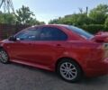 Червоний Міцубісі Lancer, об'ємом двигуна 2 л та пробігом 146 тис. км за 9000 $, фото 3 на Automoto.ua