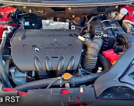 Красный Мицубиси Лансер, объемом двигателя 2 л и пробегом 254 тыс. км за 6300 $, фото 13 на Automoto.ua