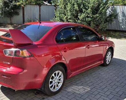 Мицубиси Лансер 2011 в Днепре (Днепропетровске) на Automoto.ua Красный Мицубиси Лансер, объемом двигателя 2 л и пробегом 242 тыс. км за 6500 $, фото 3 на Automoto.ua