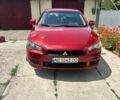 Червоний Міцубісі Lancer, об'ємом двигуна 1.5 л та пробігом 210 тис. км за 7600 $, фото 1 на Automoto.ua