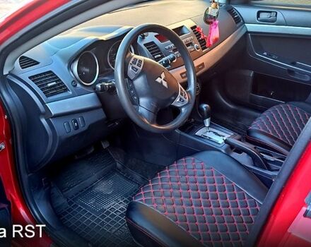 Красный Мицубиси Лансер, объемом двигателя 2 л и пробегом 254 тыс. км за 6300 $, фото 8 на Automoto.ua