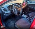 Красный Мицубиси Лансер, объемом двигателя 2 л и пробегом 254 тыс. км за 6300 $, фото 8 на Automoto.ua