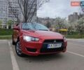 Красный Мицубиси Лансер, объемом двигателя 1.5 л и пробегом 107 тыс. км за 7200 $, фото 1 на Automoto.ua