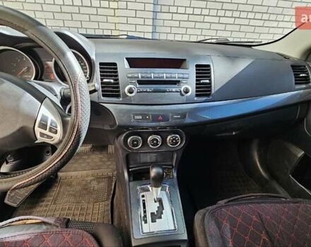 Мицубиси Лансер 2011 в Днепре (Днепропетровске) на Automoto.ua Красный Мицубиси Лансер, объемом двигателя 2 л и пробегом 242 тыс. км за 6500 $, фото 7 на Automoto.ua