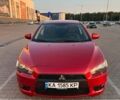 Красный Мицубиси Лансер, объемом двигателя 1.5 л и пробегом 81 тыс. км за 8800 $, фото 1 на Automoto.ua