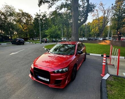 Красный Мицубиси Лансер, объемом двигателя 2 л и пробегом 260 тыс. км за 7300 $, фото 7 на Automoto.ua