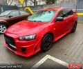 Червоний Міцубісі Lancer, об'ємом двигуна 2 л та пробігом 230 тис. км за 6500 $, фото 1 на Automoto.ua