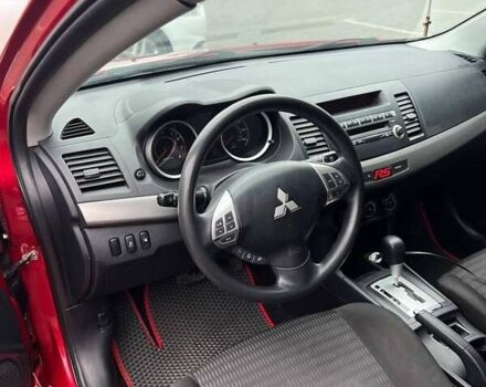 Красный Мицубиси Лансер, объемом двигателя 2 л и пробегом 230 тыс. км за 6700 $, фото 8 на Automoto.ua
