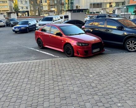 Мицубиси Лансер 2012 в Харькове на Automoto.ua Красный Мицубиси Лансер, объемом двигателя 2 л и пробегом 260 тыс. км за 6900 $, фото 6 на Automoto.ua