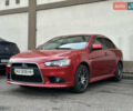 Червоний Міцубісі Lancer, об'ємом двигуна 1.59 л та пробігом 240 тис. км за 7500 $, фото 1 на Automoto.ua