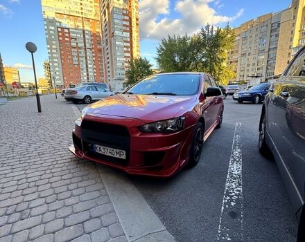 Мицубиси Лансер 2012 в Харькове на Automoto.ua Красный Мицубиси Лансер, объемом двигателя 2 л и пробегом 260 тыс. км за 6900 $, фото 7 на Automoto.ua