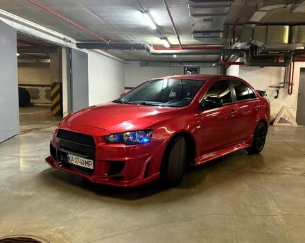 Мицубиси Лансер 2012 в Харькове на Automoto.ua Красный Мицубиси Лансер, объемом двигателя 2 л и пробегом 260 тыс. км за 6900 $, фото 5 на Automoto.ua